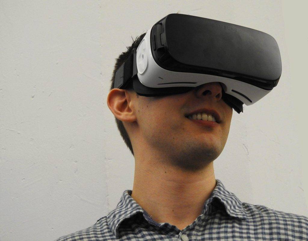 VR headset with person Immersive Virtual Reality exploration of an architectural design